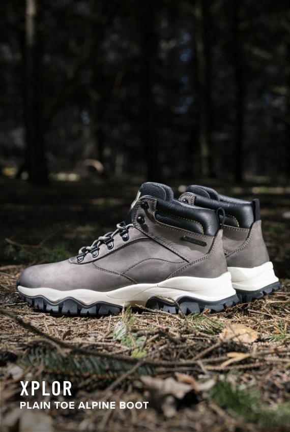 Shoes for Men view all category. Image features the Xplor Alpine boot in grey.