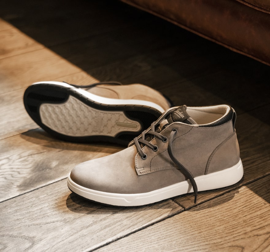 Click to shop Florsheim sneakers. Image features the Heist chukka in grey.