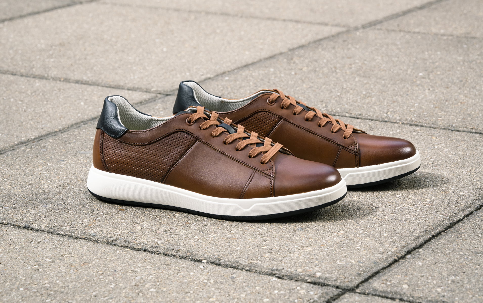 Click to shop Florsheim casuals. Image features the Heist in cognac.