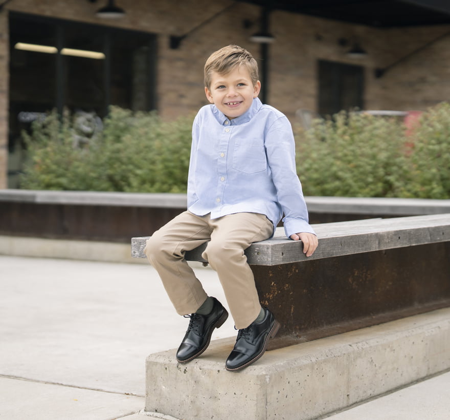 Click to shop Florsheim Kids. Image features the Rucci Jr. in black.