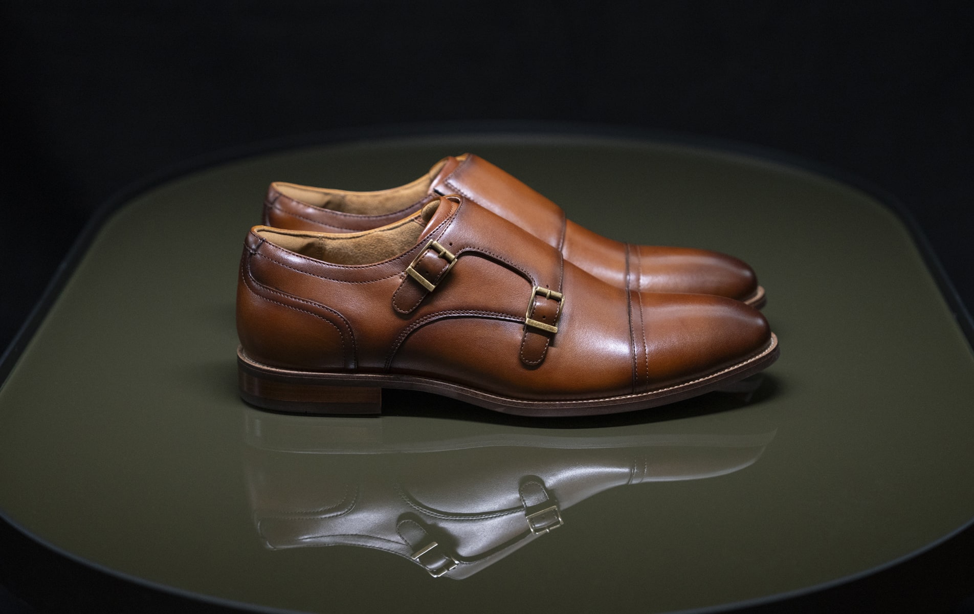 Shop Florsheim dress styles featuring the Rucci cap toe monk strap in cognac.