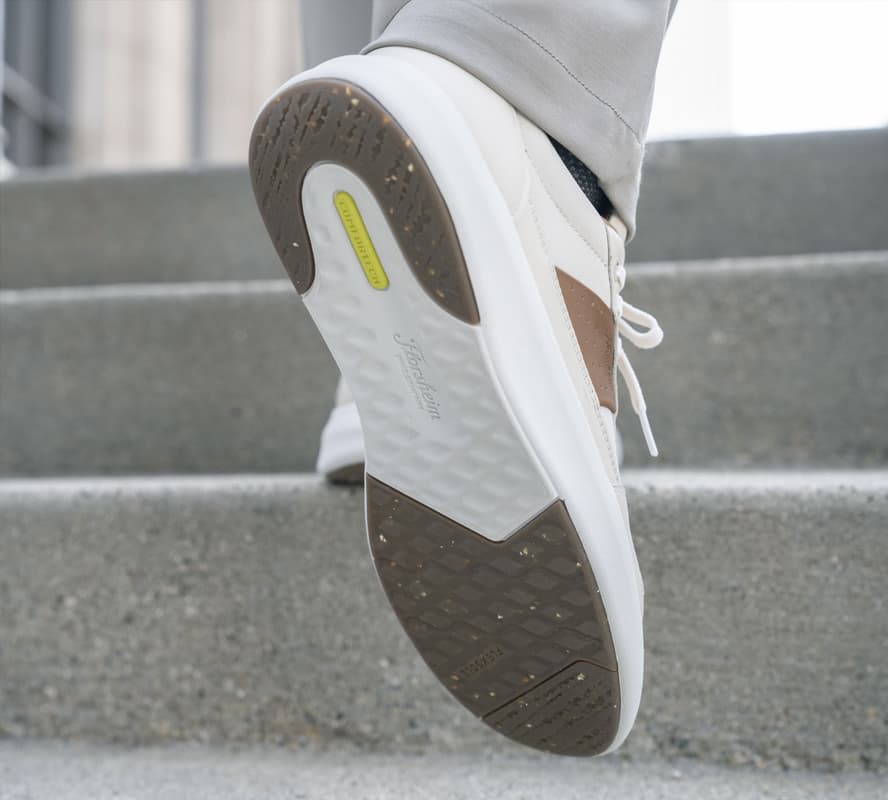 Shop Florsheim Comfortech featuring the outsole of the Crosstour as it goes up stairs.