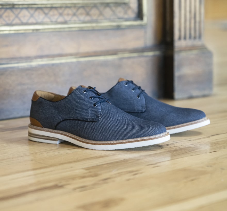 Click to shop Florsheim top sellers. Image features the Highland Canvas in navy.