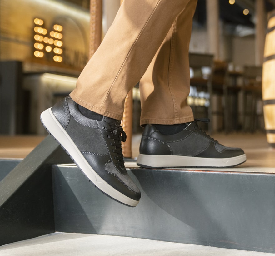 Click to shop Florsheim sneakers. Image features the Heist in black suede.