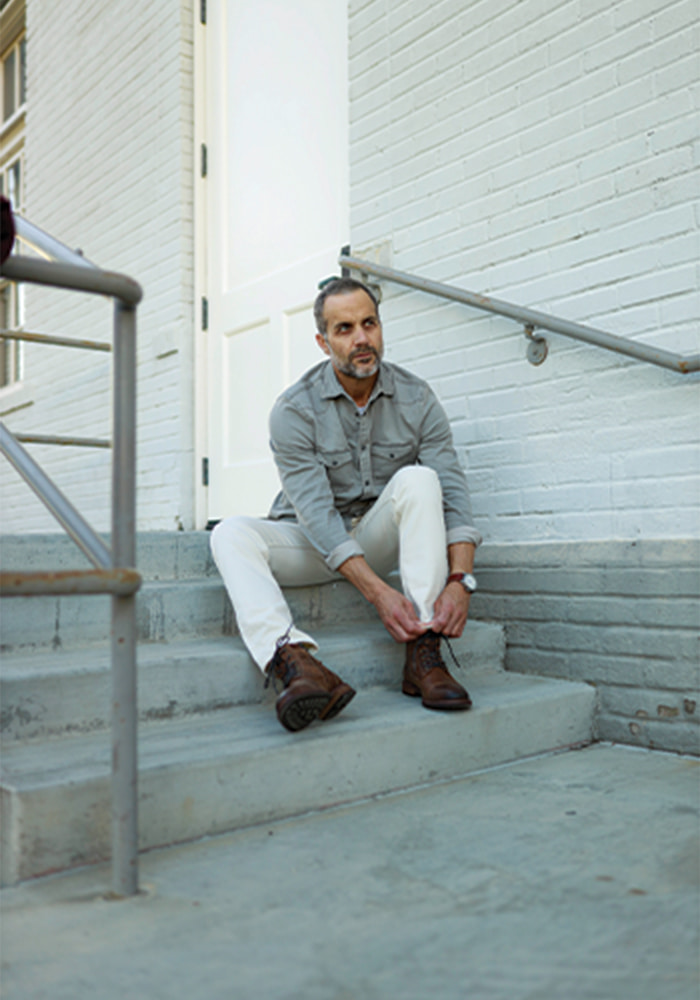 November 2021: Bret Hoffer, founder of the SilverFox Collective, sits down in our Lodge Cap Toe Lace Up Boot near Huntington Beach, California.