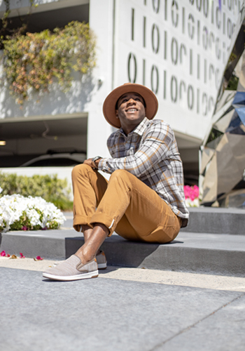 Image of social media influencer Matt Hartman standing outside in the Flair Wingtip Oxford in Cognac Multi.