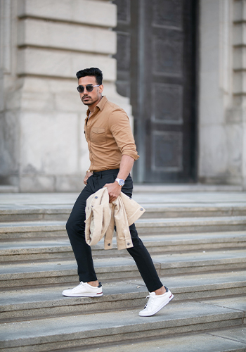 Image of social media influencer Matt Hartman standing outside in the Flair Wingtip Oxford in Cognac Multi.