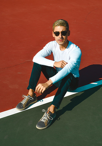 Image of social media influencer Matt Hartman standing outside in the Flair Wingtip Oxford in Cognac Multi.