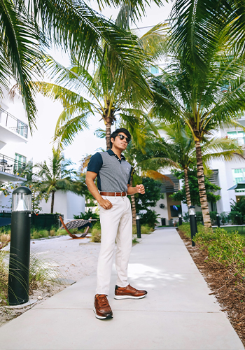 Image of social media influencer Matt Hartman standing outside in the Flair Wingtip Oxford in Cognac Multi.