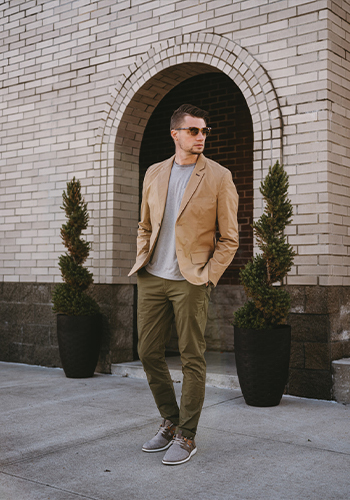 Image of social media influencer Matt Hartman standing outside in the Flair Wingtip Oxford in Cognac Multi.