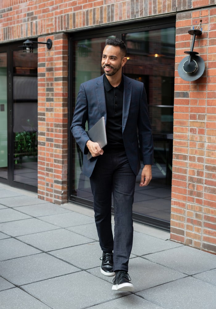 March 2022: Digital creator Victor Lopez tackles the work day in New York City while sporting our Premier Plain Toe Lace Up Sneaker.