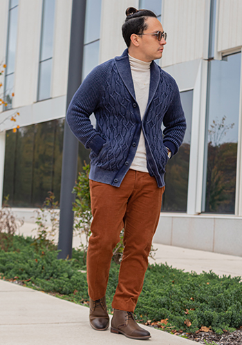 Image of social media influencer David Arango walking down the street in the Uptown Plain Toe Chukka in Brown Crazy Horse.