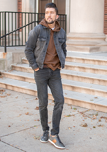 Image of social media influencer Thomas Trust walking outside in Chicago in the Crossover Lace To Toe Sneaker in Gray. 