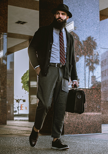 Image of social media influencer Anthony Mastracci walking outside in the Flair Wingtip Oxford in Burgundy.