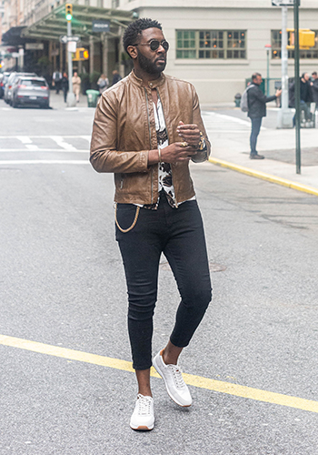 Image of social media influencer Jean Cozier walking down the streets of New York in the Fusion Sport Lace Up in White.