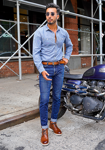 Image of social media infleuncer Mark Bay wearing the Astor Plain Toe Chukka Boot in Cognac in an NYC street.                                         