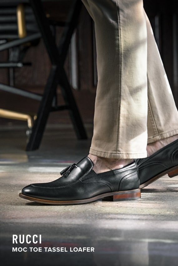 Men's Dress Shoes category. Image features the Rucci Tassel loafer in black. 