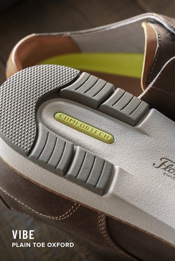 Florsheim Comfortech category. Image features the Vibe Plain Toe Oxford in brown.