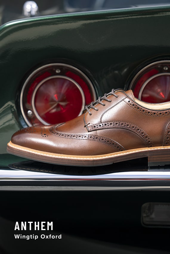 Men's Wingtips category. Image features the Anthem wingtip in cognac.