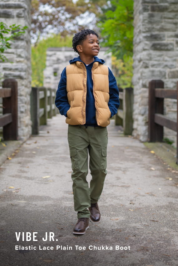 Kids Shoes view all category Images features the Vibe Jr. Elastic Lace Plain Toe Chukka Boot.