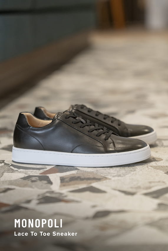 Men's Hybrid Shoes  Image features the Monopoli sneaker in black.