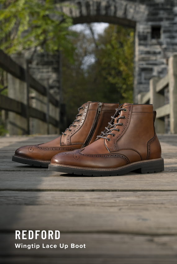 Men's Dress Boots category Image features the Redford Wingtip Lace Up Boot in Cognac.