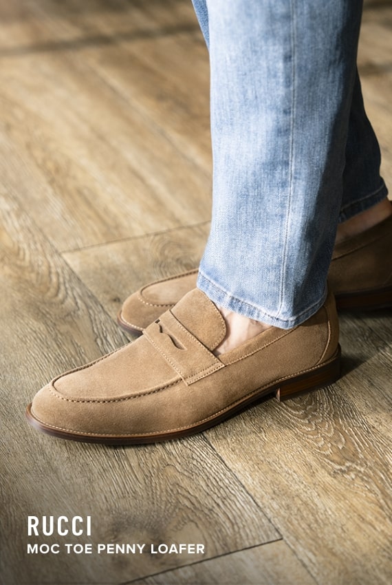 Men's Dress Shoes category. Image features the Rucci penny loafer in mushroom suede.