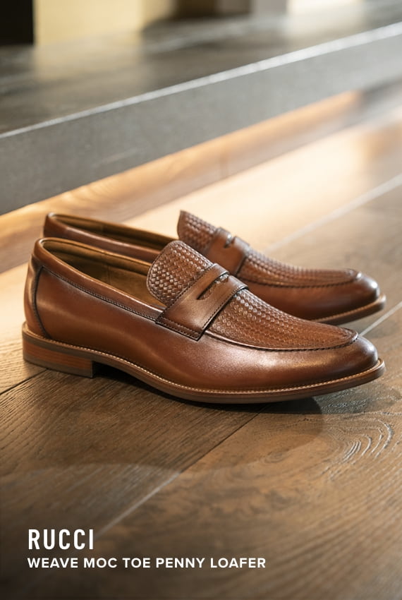 Men's Dress Shoes category. Image features the Rucci Weave penny loafer in cognac
