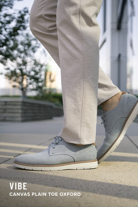 Men's Casual Shoes category. Image features the Vibe Canvas in grey.