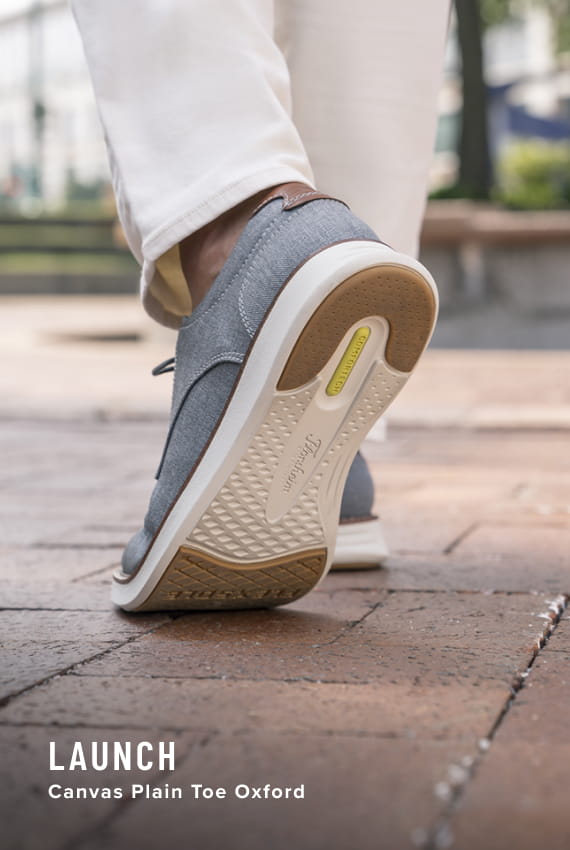 Florsheim Comfortech category. Image features the Comfortech footbed on the Launch canvas in gray.