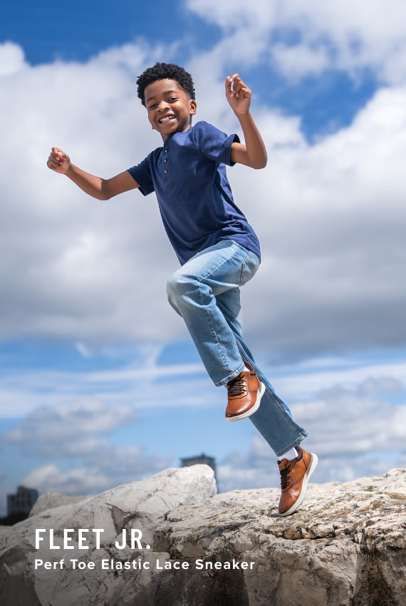 Kids Shoes view all category. Image features the Fleet Jr. in cognac. 