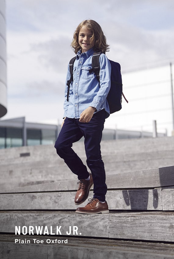 Kids Shoes view all category. Image features the Norwalk Jr. in cognac.