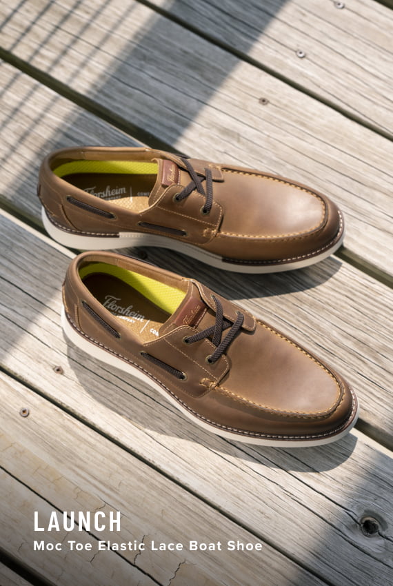 Men's Casual Shoes category. Image features the Launch Boat shoe in brown on a dock.