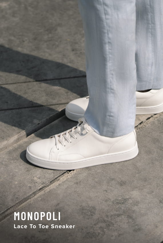 Men's Casual Shoes category. Image features the Monopoli lace up sneaker in white.