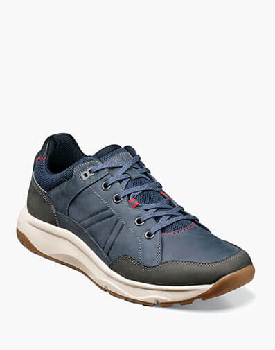 Tread Lite Moc Toe Lace Up Sneaker in Navy for $127.50 dollars.