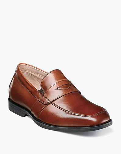 Reveal Jr. Boys Moc Toe Penny Loafer in Cognac for $75.00 dollars.