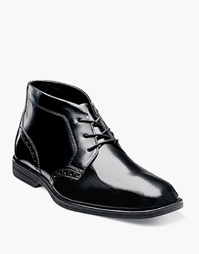 Reveal Jr. Boys Plain Toe Chukka Boot in Black for $95.00 dollars.