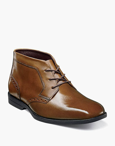 Reveal Jr. Boys Plain Toe Chukka Boot in Cognac for $95.00 dollars.