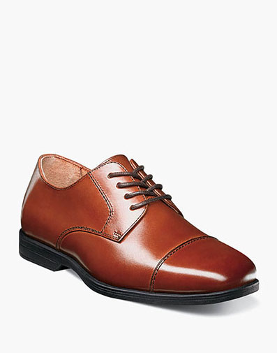 The featured product is the Reveal Jr Plain Toe Oxford.
