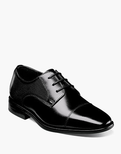 The featured product is the Postino Jr Cap Toe Oxford.